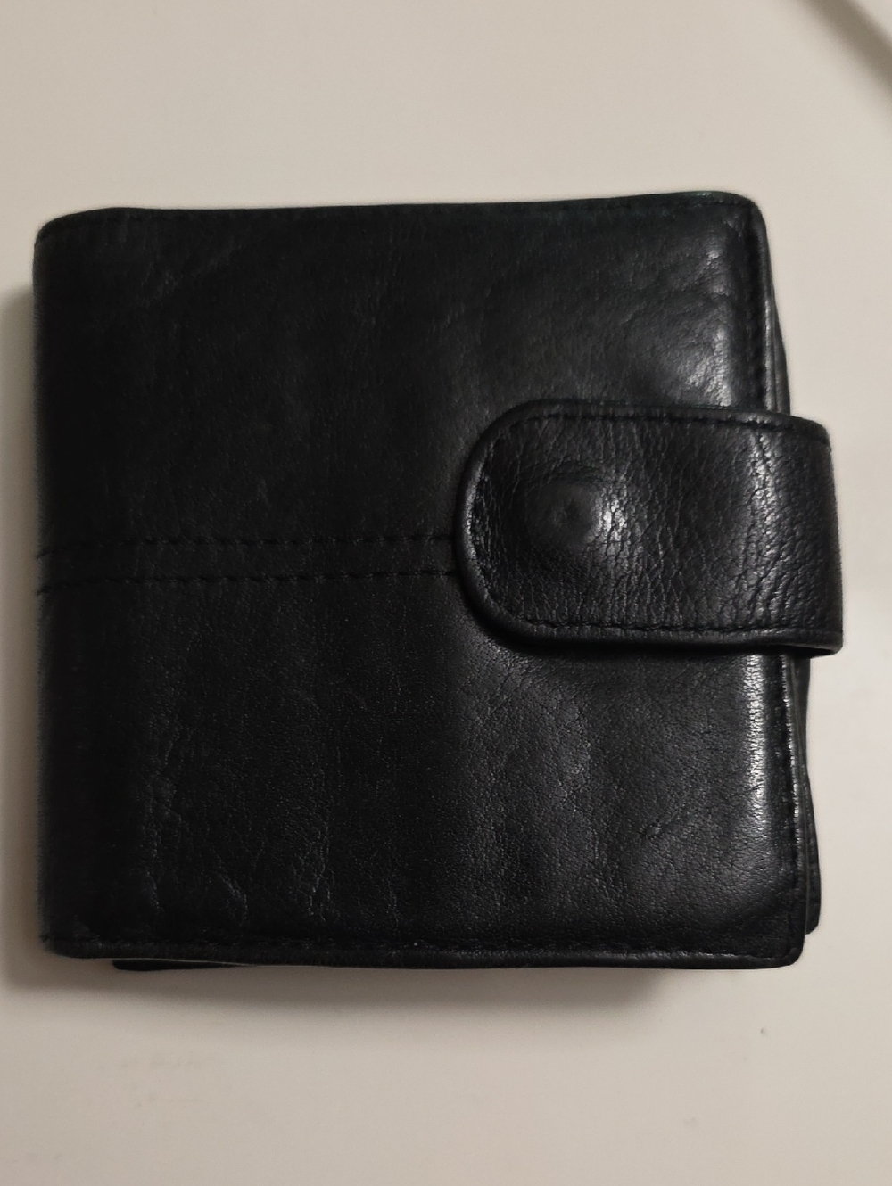 Wilson Black Leather Fold Wallet with Embossed Logo